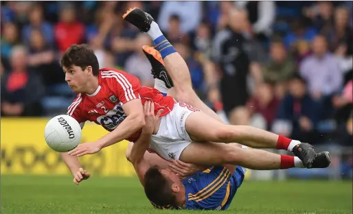  ??  ?? Conor Sweeney of Tipperary in action against Kevin Crowley of Cork during the Munster SFC semi-final at Semple Stadium in Thurles. Photo by Sportsfile