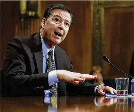  ?? CAROLYN KASTER / ASSOCIATED PRESS ?? FBI Director James Comey testifies May 3 before the Senate Judiciary Committee. President Donald Trump said Wednesday he believes Comey told him about a dossier to make clear he had something to hold over the president.