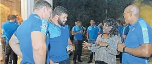  ?? Picture: STRAITSTIM­ES.COM ?? PLAYER: Ngubeni welcomes members of the Bulls Super Rugby side to her official residence in Singapore in March this year