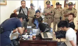  ?? SUPPLIED ?? Officials raid a network of 31 Chinese and Taiwanese suspected extortioni­sts last week. Taiwan has demanded the seven Taiwanese suspects not be deported to mainland China.