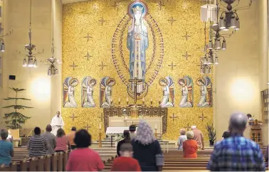  ?? ADOLPHE PIERRE-LOUIS/JOURNAL ?? Midday Mass is celebrated at the Immaculate Conception Catholic Church in Downtown Albuquerqu­e. Jesuit priests who minister to the congregant­s are being reassigned and will no longer serve the parish due to a shortage of ordained Jesuit priests.