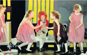  ?? 050617ANNE_01 ?? Mopping up The young performers, including Taylor Brown in the lead role of Annie, got huge for their performanc­es