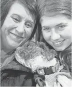  ?? JENNIFER SMITH ?? Jayme Closs poses with her aunt, Jennifer Smith, and her dog, with whom she was reunited Friday, for a photo posted on the Healing for Jayme Closs Facebook page.