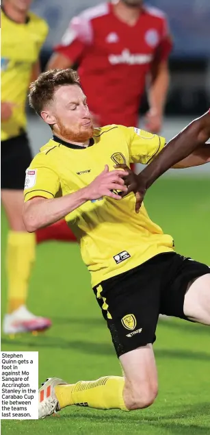  ??  ?? Stephen Quinn gets a foot in against Mo Sangare of Accrington Stanley in the Carabao Cup tie between the teams last season.