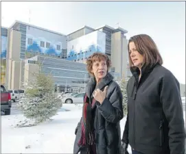  ??  ?? Wildrose Leader Danielle Smith, right, with candidate Heather Forsyth, tours the new South Health Campus on Thursday. Smith says the party’s Alberta Patient Wait Time Guarantee plan will ensure people “get the health care they need, when they need it.”