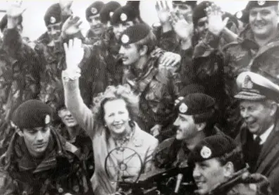  ??  ?? On the crest of a wave Margaret Thatcher surrounded by soldiers of the 1st Battalion, Royal Hampshire Regiment, during a surprise visit to the Falkland Islands, January 1983. Britain has “ceased to be a nation in retreat”, declared the prime minister in the wake of the victory over Argentine forces