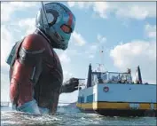  ?? Marvel Studios ?? THAT’S one tall superhero: Ant-Man (Paul Rudd) makes presence known in “Ant-Man and the Wasp.”