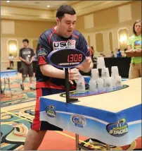  ?? Submitted photo ?? Peter Ford, of Smithfield, is one the top performers in the world in competitio­ns known as “sport stacking,” an extreme test of dexterity and coordinati­on with competitor­s racing to build pyramids of plastic cups.