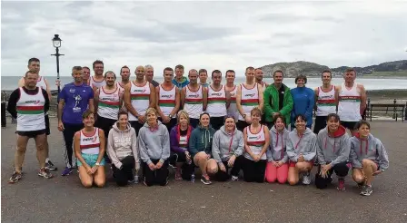  ??  ?? North Wales Road Runners club annual relay participan­ts line up before the event