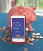  ?? JENNIFER JOLLY/SPECIAL FOR USA TODAY ?? My piggy bank and the Stash app — which one is likely to save more of my small change over time?