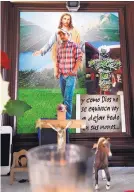  ?? MARCO UGARTE ASSOCIATED PRESS ?? A photograph of Jose Rangel Chavez is surrounded by religious images, a miniature horse statue and a lit candle, on an altar inside what would have been Jose’s new bedroom in El Sabino, Mexico, on July 15, 2016. The text at right reads in Spanish “And...