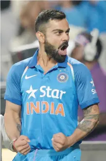  ??  ?? PUNE: This file photo taken on Sunday shows India’s captain Virat Kohli celebratin­g after India won the first One-Day Internatio­nal (ODI) cricket match against England at The MCA Internatio­nal Cricket Stadium in Pune. India skipper Virat Kohli has said...