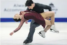  ?? GEOFF ROBINS/AFP/GETTY IMAGES ?? Ice dancers Tessa Virtue and Scott Moir are aiming to win at the nationals and head to the Olympics.