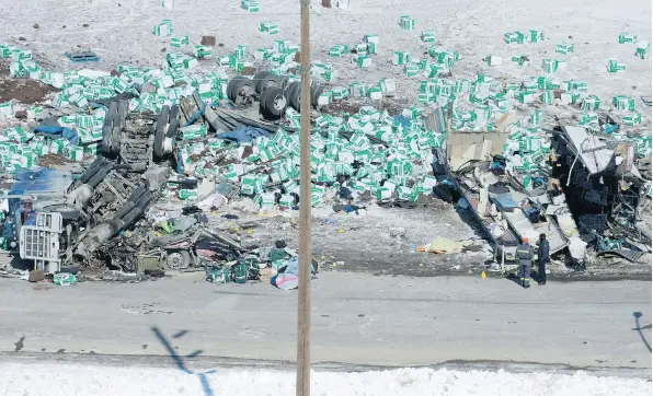  ?? JONATHAN HAYWARD/THE CANADIAN PRESS ?? The crash scene ‘was chaos,’ says Myles Shumlanski, father of injured player Nick Shumlanski. The crash site near Tisdale is shown here Saturday.