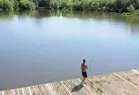  ?? DAVID MAIALETTI/AP ?? Hugh Poole fishes at a pond in FDR Park in Philadelph­ia on May 24.