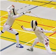  ?? Photo: Jonathan Wong* ?? Nicholas Choi (left) takes on Leung Chin-yu at the LCSD Open at the Hong Kong Park Sports Centre.