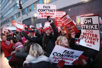  ?? ?? Nurses on strike at Mount Sinai medical center in New York City on Monday. Photograph: Andrew Kelly/Reuters
