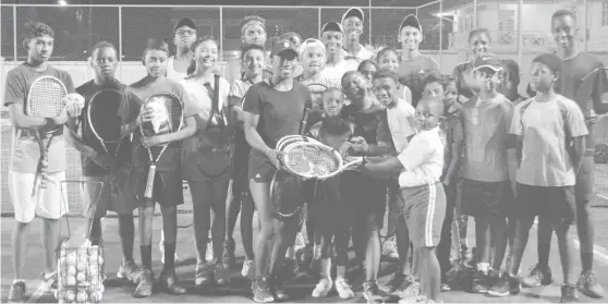  ?? (Orlando Charles photo) ?? Sachia Vickery giving back to her Guyanese lawn tennis family at the GBTI Lawn Tennis Court in Bel- Air on Friday.