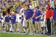  ?? AP PHOTO/TYLER KAUFMAN ?? LSU coach Ed Orgeron's Tigers have been more aggressive on fourth down this season compared to last year, and the influence of independen­t analysts could be part of the reason.