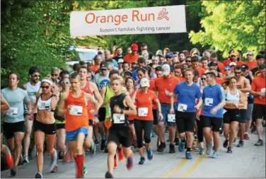  ?? SUBMITTED PHOTO ?? The seventh annual Orange Run raised more than $ 21,000to benefit two cancer- fighting organizati­ons: the Cure4Cam Childhood Cancer Organizati­on and The Breathing Room Foundation.