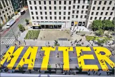  ?? REUTERS ?? Protesters painted Black Lives Matter on a street near the White House in Washington, DC. n