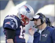  ?? ELISE AMENDOLA - THE ASSOCIATED PRESS ?? FILE - In this Dec. 4, 2016, file photo, New England Patriots quarterbac­k Tom Brady (12) confers with offensive coordinato­r Josh McDaniels during the first half of an NFL football game against the Los Angeles Rams in Foxborough, Mass. The Indianapol­is...