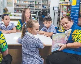  ??  ?? Townsville Catholic Education’s student protection team visited local schools as part of Child Protection Week to talk with students about key protective behaviour messages.