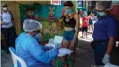  ??  ?? Centro de toma de pruebas del coronaviru­s en Santo Domingo, República Dominicana