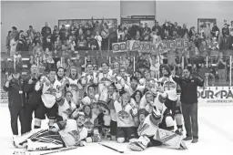  ??  ?? The Flagstaff Avalanche pose with their Division 2 championsh­ip trophy.