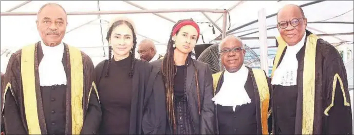 ?? ?? A LEGAL LUMINARY GOES HOME...
L-R: Representa­tive of the Body of Senior of Advocates of Nigeria, Mr. Louis Mbanefo SAN; daughter of the deceased, Mrs. Sally Uwechue-Mbanefo; grand-daughter of the deceased, Miss Chantal Mbanefo; former employee of the deceased, Mr. Luke Chidi Ilogu SAN, and former President of the Nigerian Bar Associatio­n, Dr. Olisa Agbakoba SAN at the final funeral service of the former Chairman of the Body of Benchers, Chief George Uwechue in Ogwashi-Uku, Delta State…recently