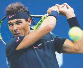 ?? Picture: GETTY ?? Rafael Nadal hits a return against Juan Martin del Potro during their semi-final