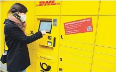  ?? FOTO: FEDERICO GAMBARINI/DPA ?? Die DHL eröffnet eine modulare Packstatio­n in der Wangener Straße in Ravensburg.