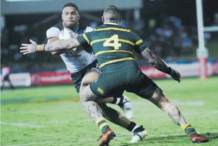  ?? Photo: Jone Luvenitoga ?? Powerful Vodafone Fiji Bati centre Taane Milne takes on the Australian Kangaroos defence at the ANZ Stadium, Suva on October 14, 2017.