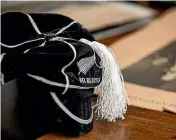  ?? ?? All Black #515 Roper has a box of rugby memorabili­a that includes his cap, photos and scrapbooks of yellowing newspaper articles.