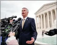  ??  ?? South Dakota AP/ANDREW HARNIK Attorney General Marty Jackley speaks about the Internet sales tax case Tuesday outside the U.S. Supreme Court.