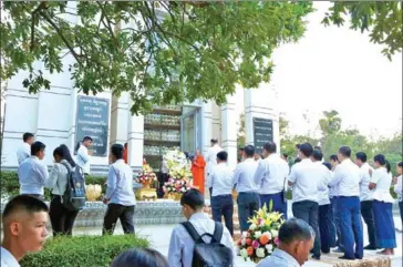  ?? HUN MANY VIA FB ?? Commemorat­ions of Victory over Genocide Day at the Choeung Ek killing field on the outskirts of Phnom Penh on January 6.