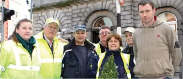  ??  ?? Joe and fellow council staff at one of the planter boxes on West Street.