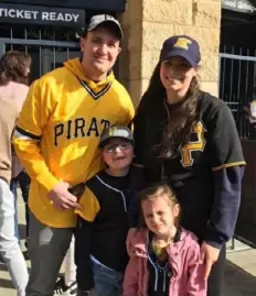  ?? Rich Pierce ?? New WPXI-TV reporter Rich Pierce poses outside of PNC Park with his wife, Katie, and two children, Benny and Hallie Jo.