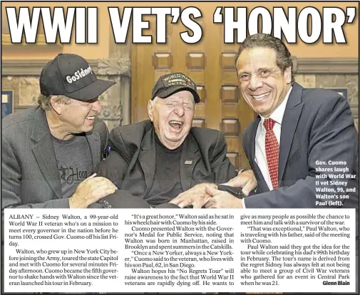  ??  ?? Denis Slattery Gov. Cuomo shares laugh with World War II vet Sidney Walton, 99, and Walton’s son Paul (left).