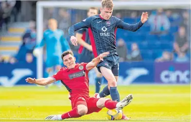  ?? ?? St Mirren’s Matt Millar tackles Jack Burroughs