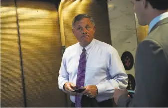  ?? Alex Wong / Getty Images ?? Chairman Richard Burr (R-NC), leaving a closed hearing of the Senate (Select) Intelligen­ce Committee, said there’s no reason to dispute U.S. intelligen­ce assessment of Russian meddling.