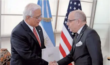  ?? US EMBASSY IN BUENOS AIRES ?? US Ambassador Edward Prado with Argentina’s Foreign Minister Jorge Faurie.