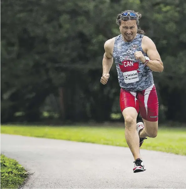  ?? GREG SOUTHAM ?? Greg Shimizu was training for the national triathlon championsh­ips when he was injured in a collision while riding his bike. On Saturday he’ll be racing in the ITU World Triathlon in support of mild traumatic brain injury and Edmonton-based non-profit...
