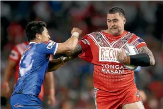  ?? GETTY IMAGES ?? Andrew Fifita, of Tonga, runs the ball during the Pacific test invitation­al match against Samoa at Campbellto­wn Sports Stadium on Saturday night.