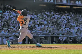  ?? MARK J. TERRILL/ASSOCIATED PRESS ?? Oakland catcher Shea Langeliers hits a solo home run in the fourth inning of the Futures Game Saturday in Los Angeles. He also threw out a runner at third to be named the game’s MVP.