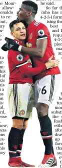  ??  ?? Welcome: Sanchez and Pogba share an embrace