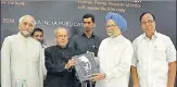  ?? SONU MEHTA/HT PHOTO ?? ▪ Former president Pranab Mukherjee (second from left) and former prime minister Dr Manmohan Singh (third) release a book 'Jawaharlal Nehru: An Illustrate­d Biography', edited and published by A Gopanna (right) as former vice president Hamid Ansari...