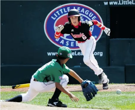  ?? GENE J. PUSKAR/THE ASSOCIATED PRESS ?? East Nepean’s David Legault hits a comebacker to Chinese Taipei pitcher Teng-Yao Yu during the fifth inning in Internatio­nal pool play at the Little League World Series tournament in South Williamspo­rt, Penn., Friday. Yu threw to first to record the out.