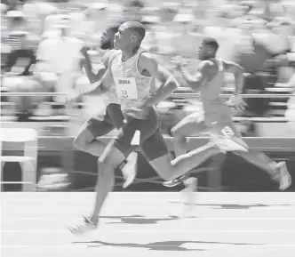  ?? — Gambar AFP ?? AKUR: Coleman sedang bersaing dalam final acara 200 meter pada Pertanding­an Kelayakan Kejohanan Dunia AS di Stadium Hornet, Sacramento, California.