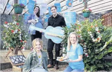  ??  ?? On somg Stevie McCrorie gets set for his garden gathering with Claire McNeill, Alex McCue and Siobhan O’Hara from Parkinson’s UK
